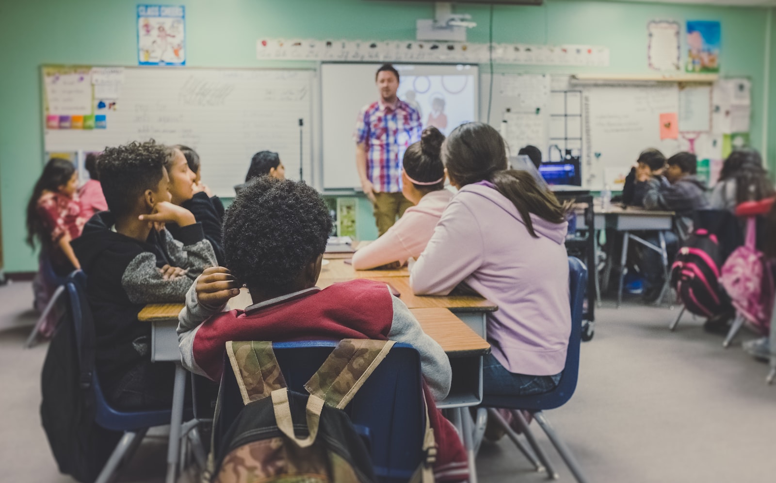 Modern classroom with students and a teacher