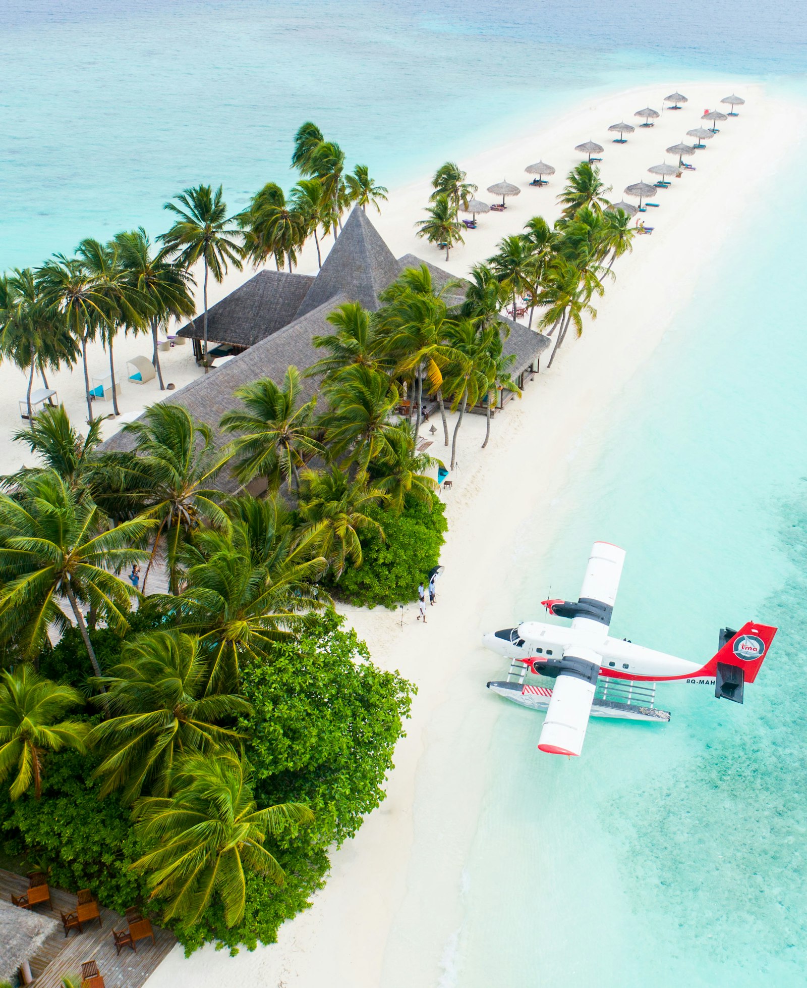 Travel agent helping a client plan a trip
